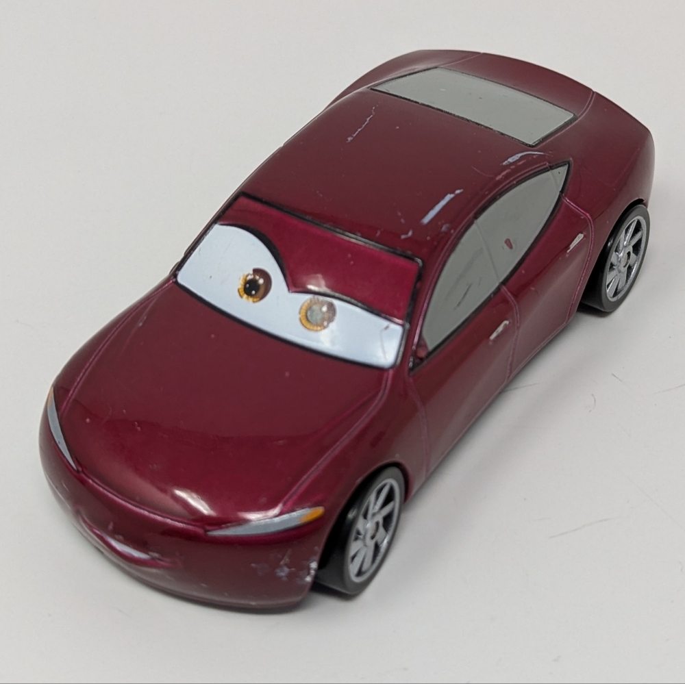 Disney Pixar Cars Movie Diecast Natalie Certain Maroon